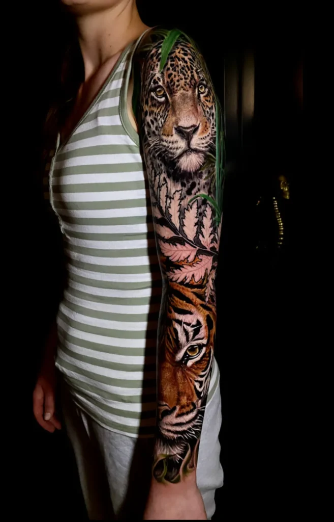 Der ultimative Guide für deine permanente Kunst: Welcher Tattoo Stil passt zu dir? 4 color and realism tattoo animals design arm sleeve latelier tattoo studio graz jannes