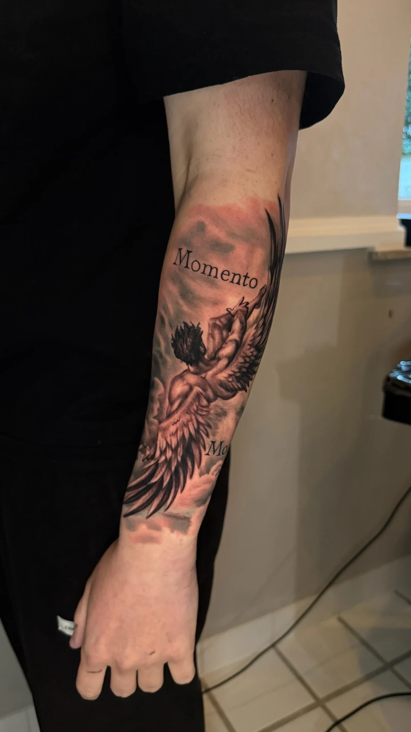 Black and gray realism of fallen angerl by ruvens latelier graz