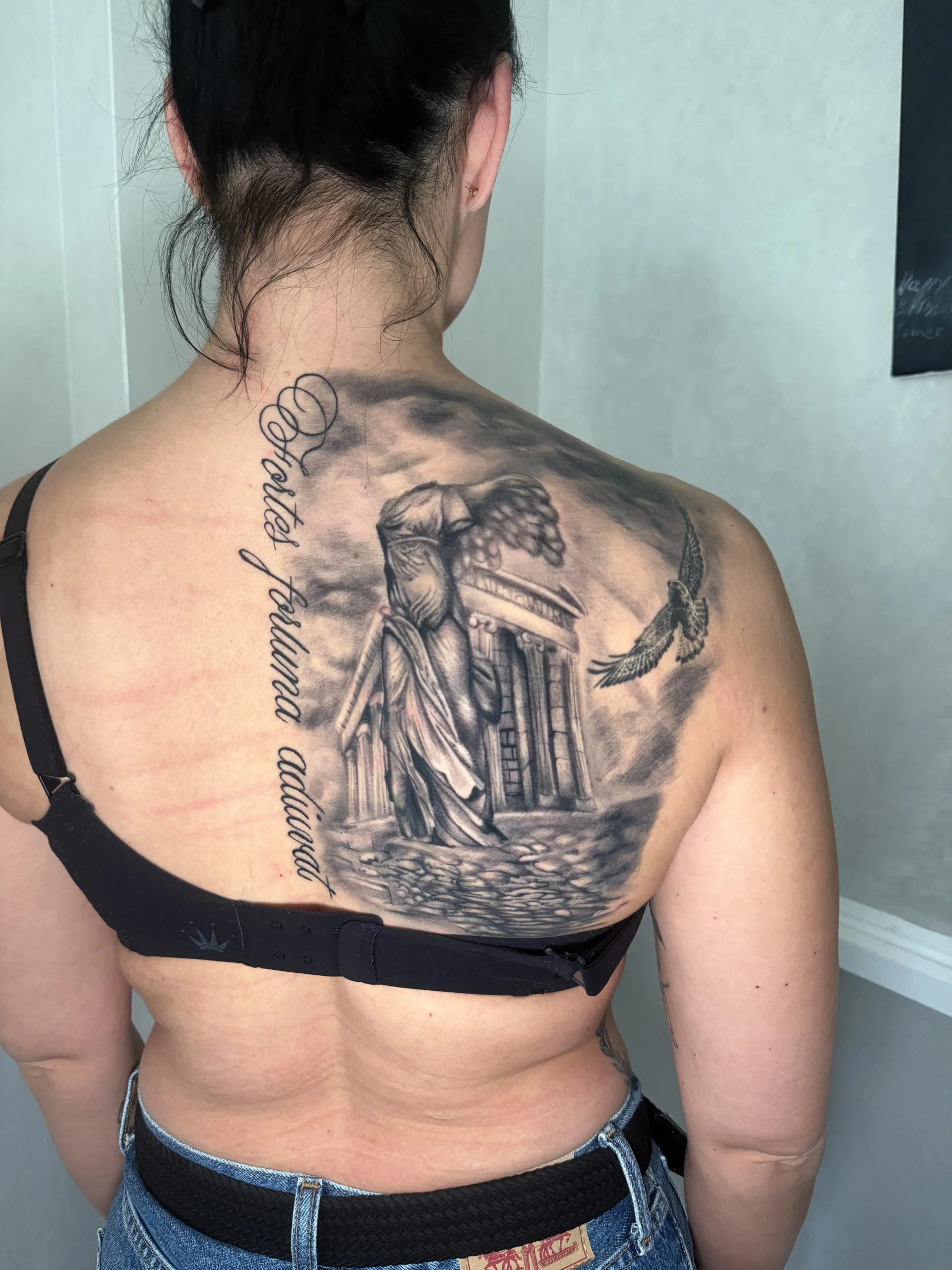 Black and gray realism tattoo at latelier graz by ruvens