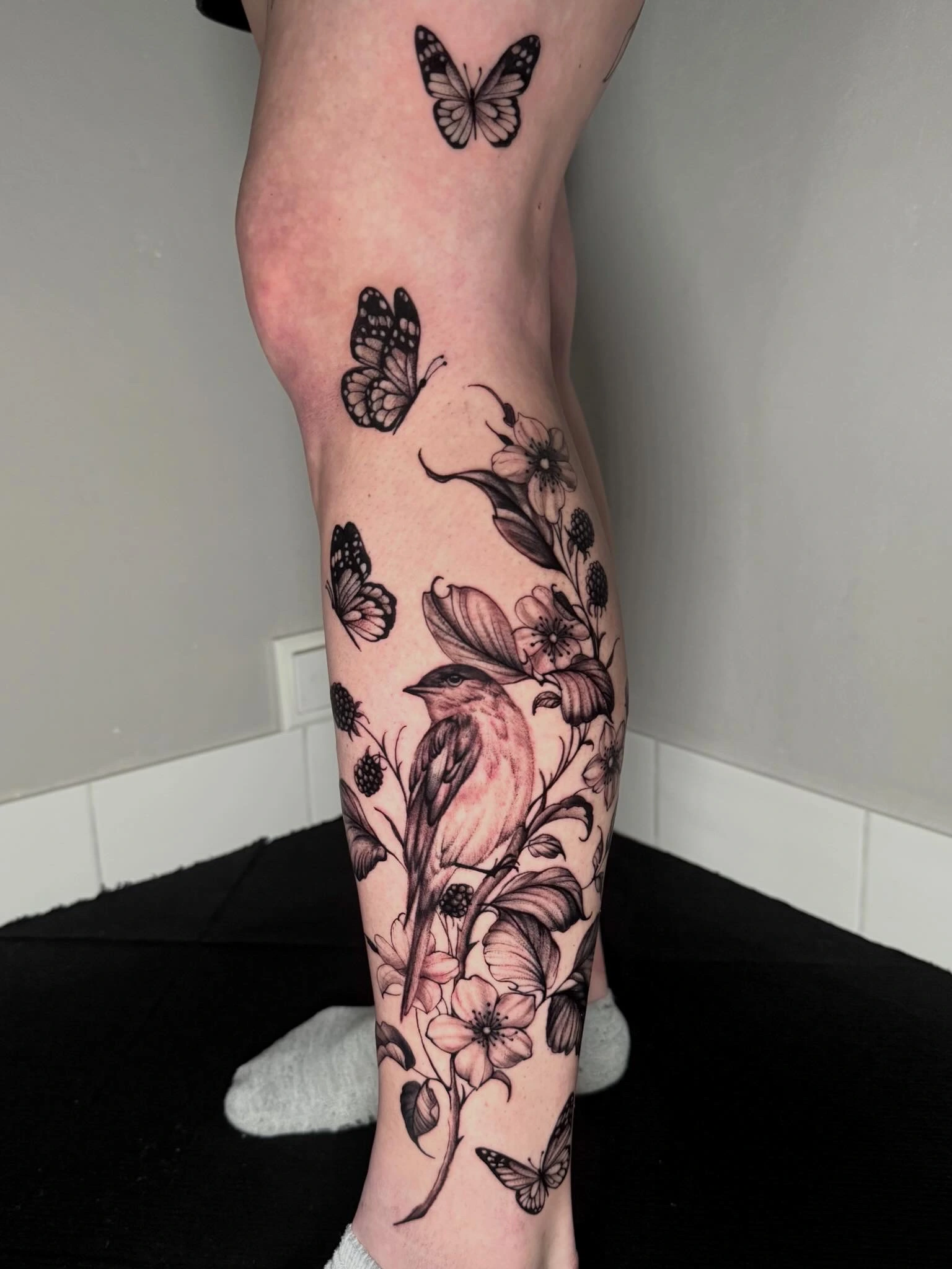 Minimalism tattoo of floral bird by ruvens at latelier